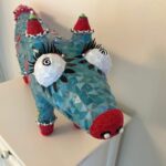 Dog sculpture detail, front